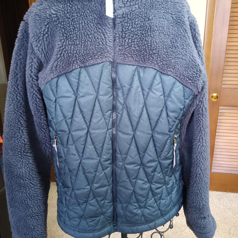 Patagonia Navy Teddy Jacket with Quilted Design. All Good Except Area On Sleeve,
